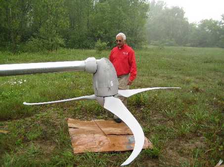 man-and-wind-turbine man and wind turbine2 Farm Income Land for Wind Farms Additional Income For Landowners